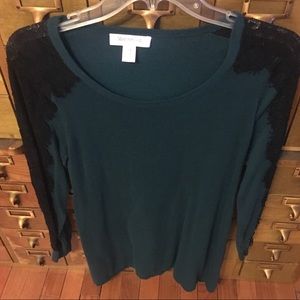 Green maternity sweater.